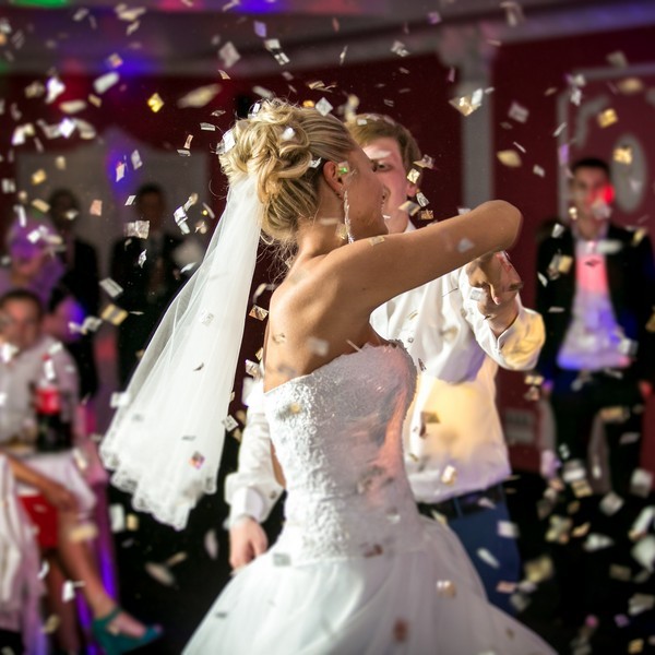 wedding confetti filling the air