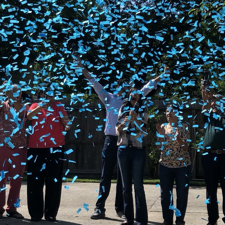 Gender reveal confetti cannon with blue confetti